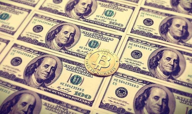 Bitcoin w praktyce - miesiczny raport Overstock 